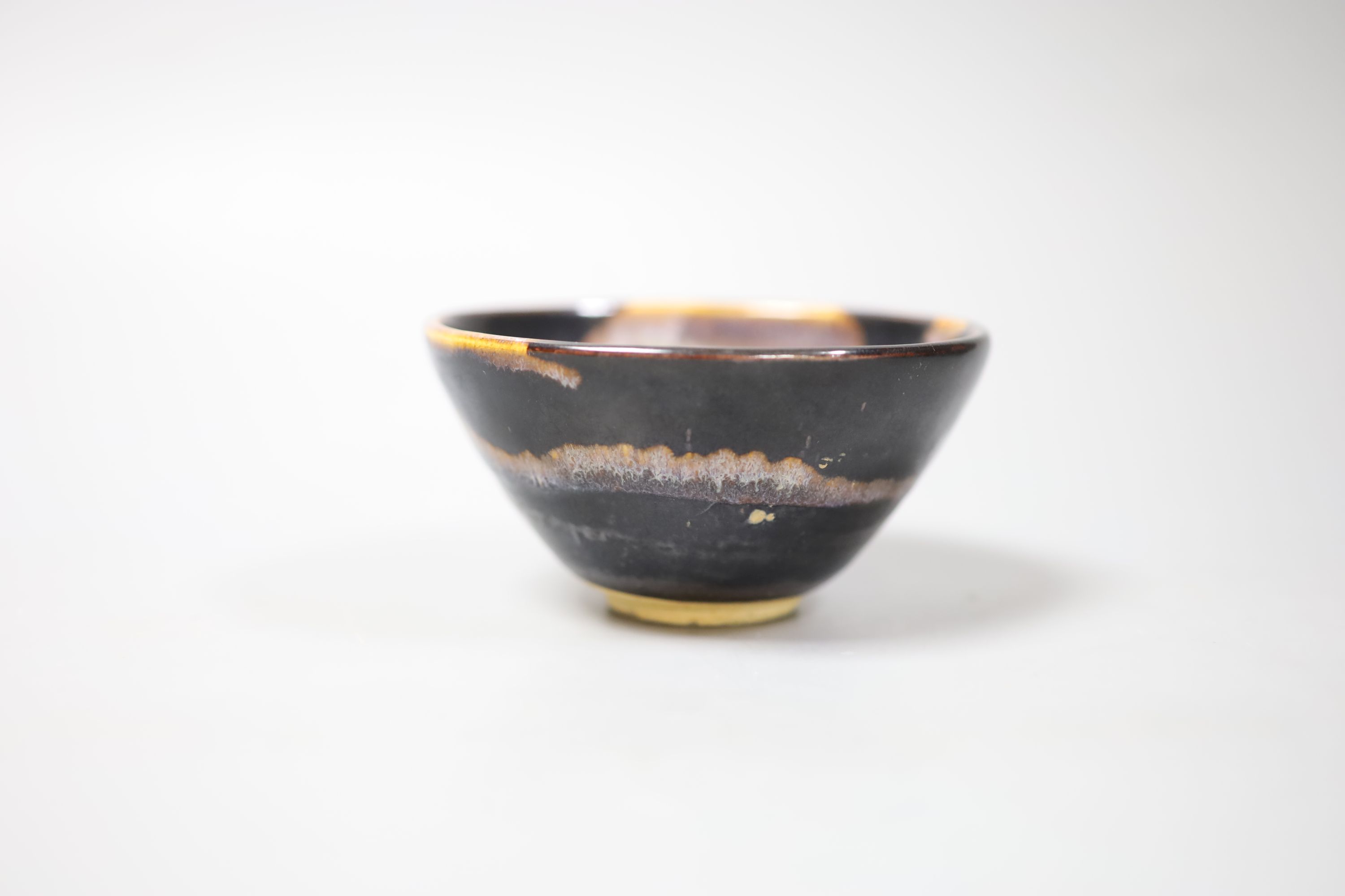 A Chinese blackware splashed bowl 11cm diam